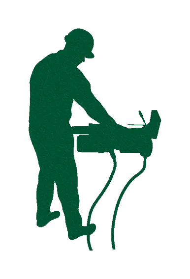 機械を操作する作業員のシルエット